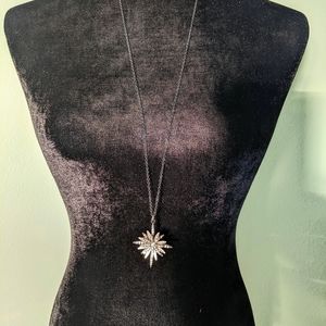 Sparkly pendant with black chain